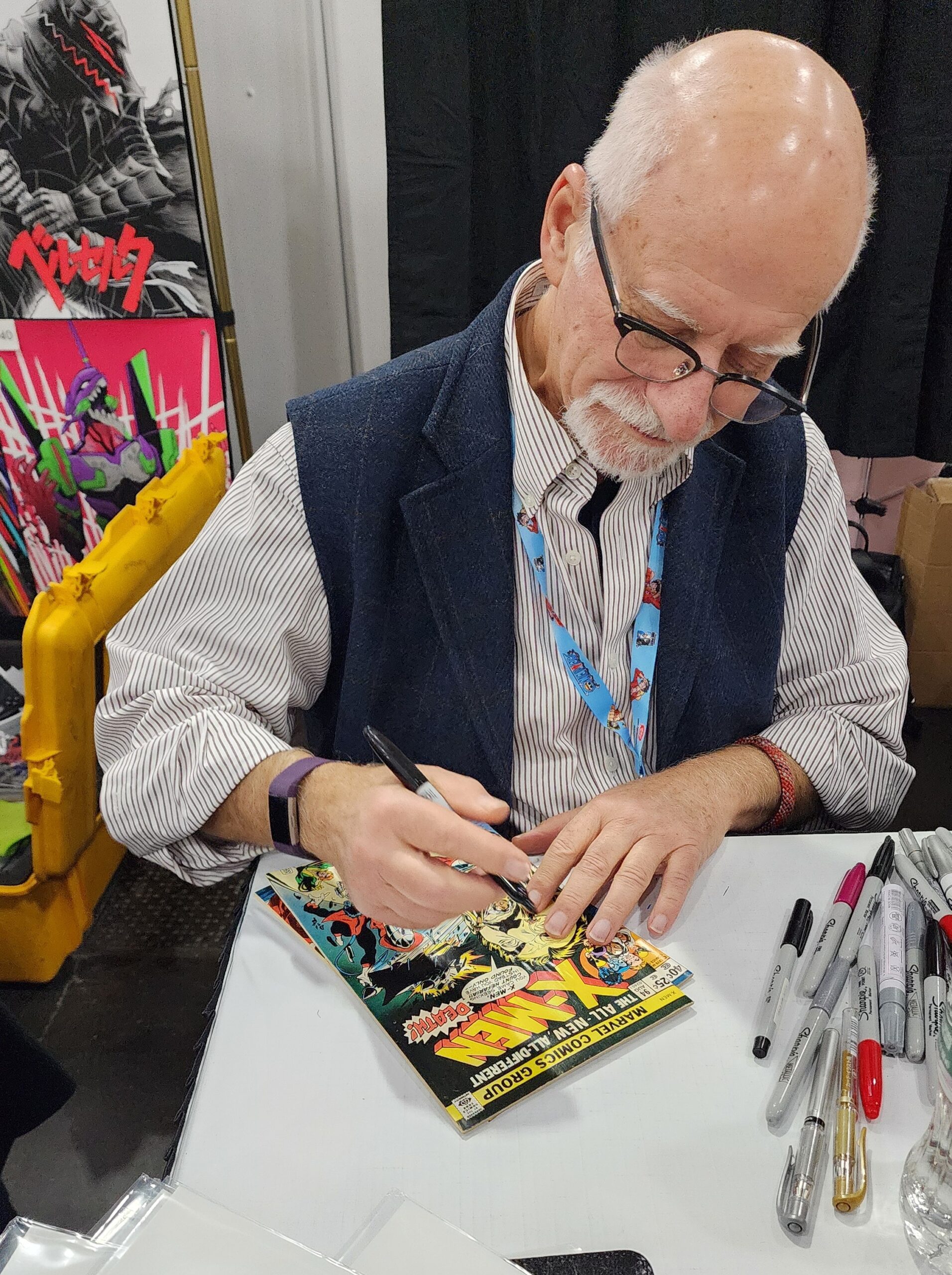 Chris Claremont, autographing one of our comics